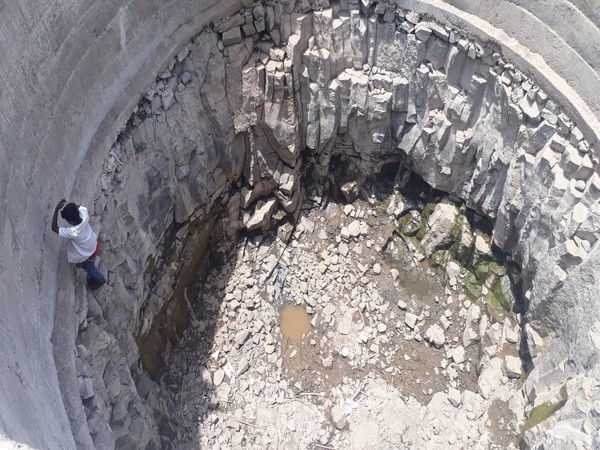 People in Melghat are forced to go as deep as 40 feet inside the wells to fetch drinking water. Photo/ANI