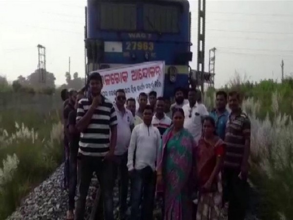 residents during the protest on unmanned railway barrier gate