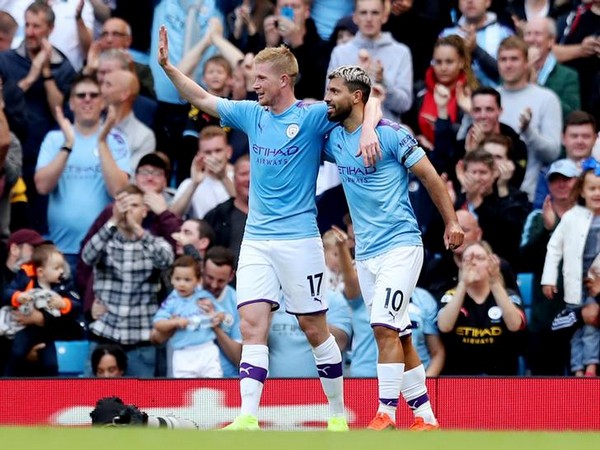 Sergio Aguero celebrates with Kevin De Bruyne after scoring goal against Brighton 
