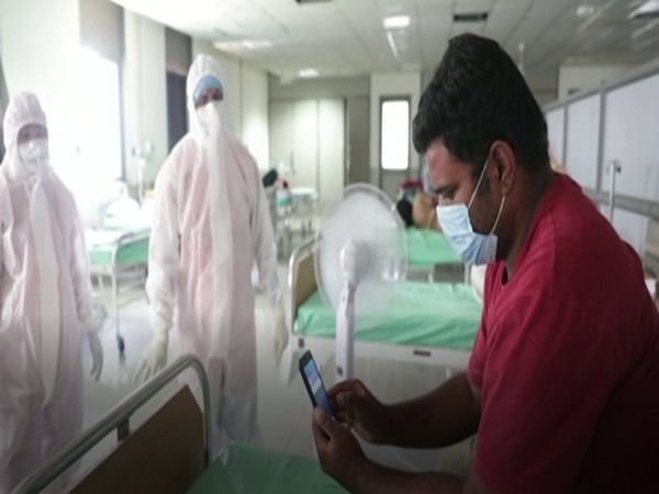 Video calling facility provided to COVID-19 patients at Civil Hospital in Ahmedabad. Photo/ ANI