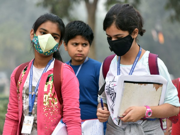 Children wearing masks in Delhi as air quality dipped to hazardous category on Friday. 