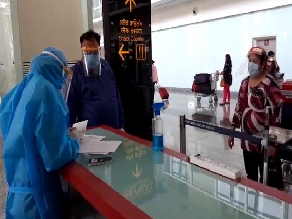 Passengers from the Air India repatriation flight at Chandigarh International Airport. 