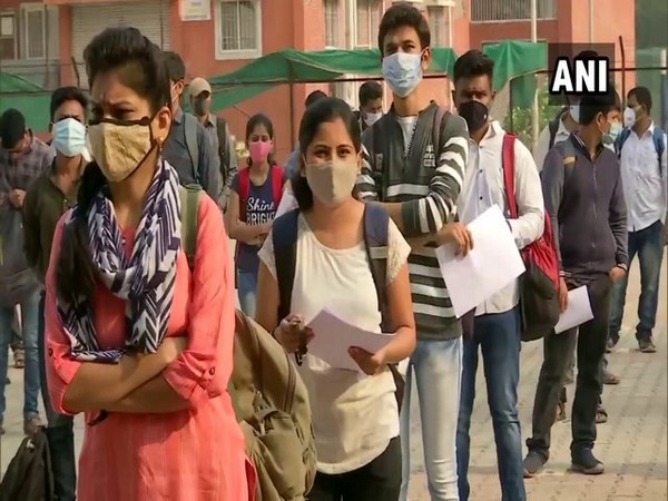 Candidates queued up in front of examination center in Pune.