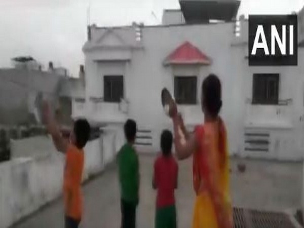 Children and women were seen clanging utensils on their roof