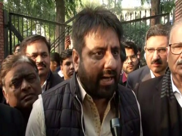AAP MLA Amanatullah Khan speaking at a protest in New Delhi on Saturday. Photo/ANI