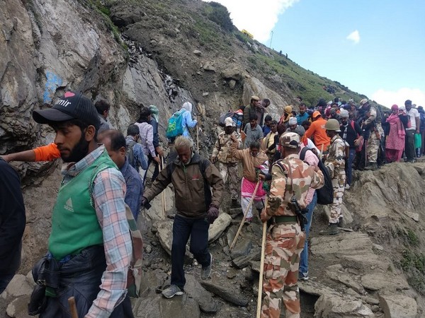 The pilgrims on the Baltal route of Amarnath Yatra on Thursday. (Photo: ANI)