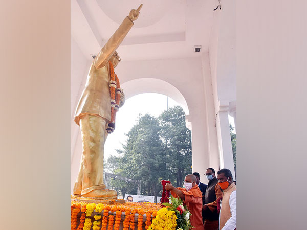 UP CM Yogi Adityanath paying floral tribute to Dr BR Ambedkar in Lucknow on Sunday. (Photo/ANI)