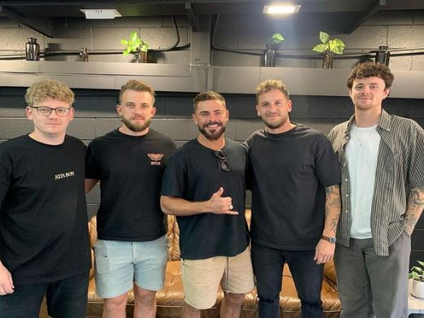 Zac Efron with salon staff (Image courtesy: Attaboy hair salon Instagram)