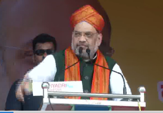 BJP president Amit Shah addressing an election rally here on Friday. Photo/ANI