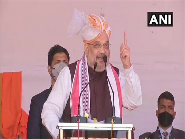 Union Home Minister Amit Shah addresses the public gathering in Imphal on Sunday. (Photo/ANI)