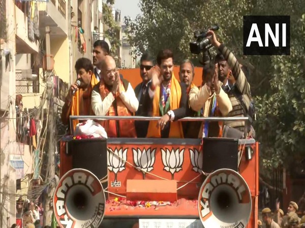 Amit Shah holds a roadshow in Seemapuri on Thursday. Photo/ANI