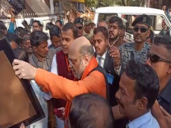 Amit Shah meets party workers in Hubali on Sunday [Photo/ANI]