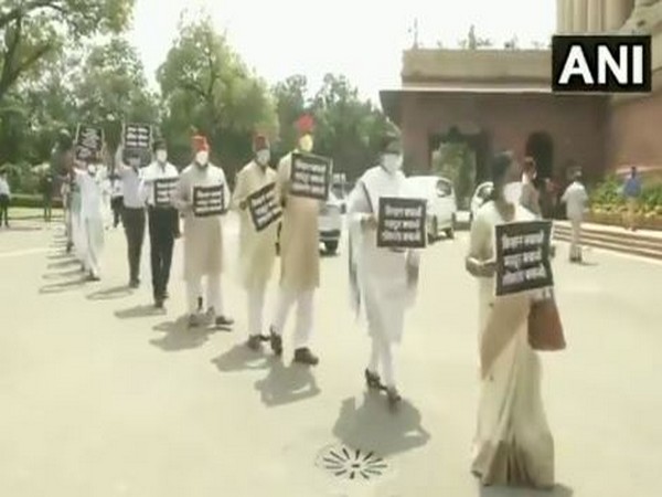MPs of Opposition parties marching in Parliament premises in protest over farm bills. (Photo/ANI)
