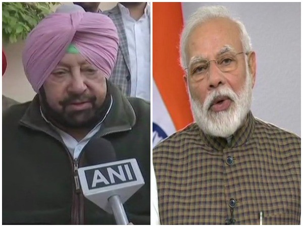 Punjab Chief Minister Amarinder Singh (L) and Prime Minister Narendra Modi
