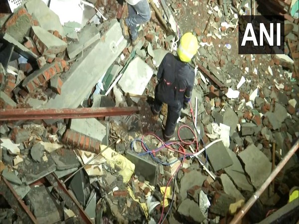 Fire fighter at the site of collapsed building in Andheri in Mumbai(File Photo/ANI)