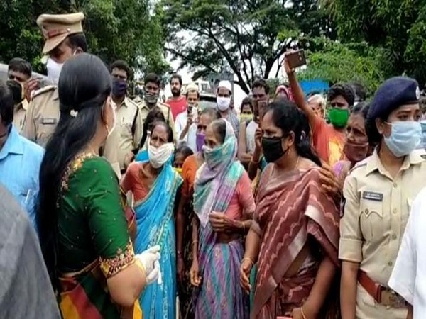 Andhra Minister Taneti Vanita while interacting with flood affected people in West Godavari district. (Photo/ANI)