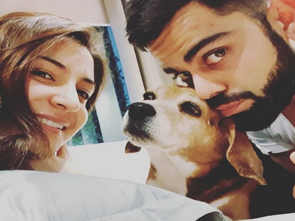 Bollywood actor Anushka Sharma with pet dog Bruno and husband Virat Kohli     (Image: Anushka Sharma/ Instagram )