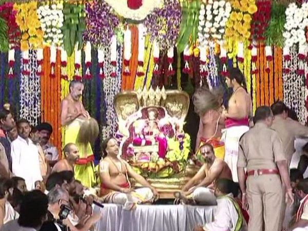 Devotees celebrate Vaikuntha Ekadashi festival in Vishakhapatnam. Photo/ANI