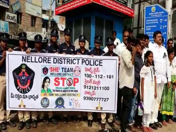 Nellore district police take out march to create awareness on women safety in Nellore. Photo/ANI