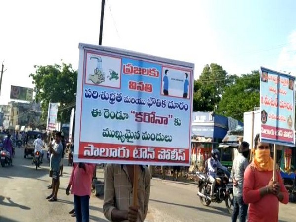 AP Police makes lockdown violators hold placards of COVID-19 slogans. Photo/ ANI