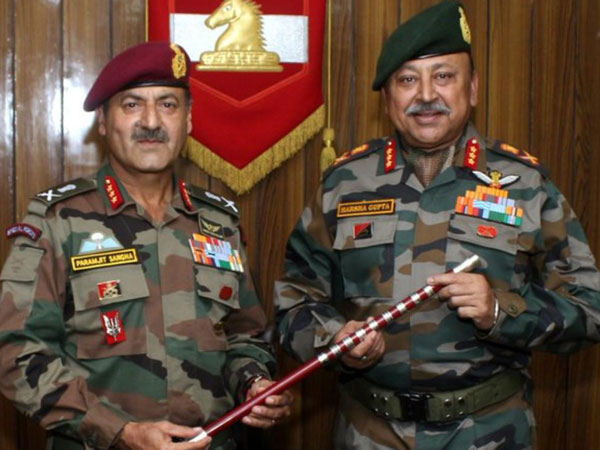 Lt Gen Paramjit Singh Sangha, left, handing the command of 'White Knight Corps' to Lt Gen Harsha Gupta, right, in Jammu on Saturday. Photo/ANI