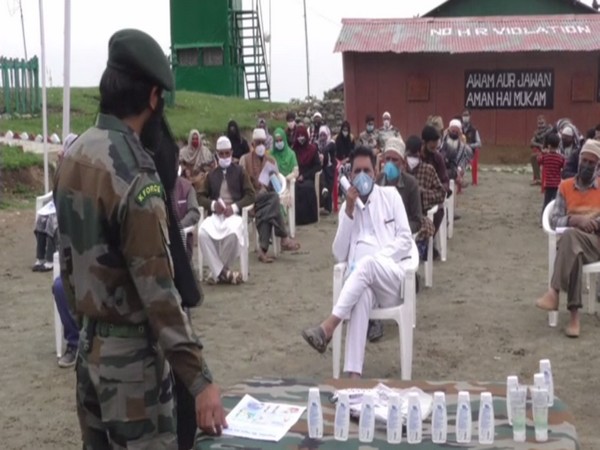 Indian Army conducts COVID-19 Awarness programme in Baramulla. (Photo/ ANI)