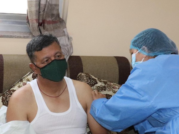 Nepal's Chief of Army Staff Purna Chandra Thapa receives his first dose of Made in India vaccine. (Photo Credit: Nepal Army)