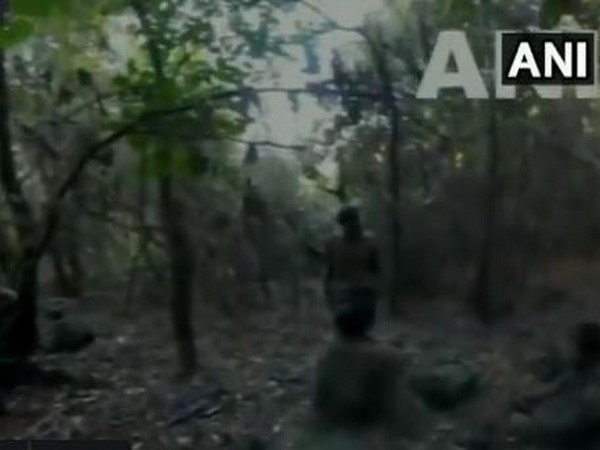 Pakistani troop movement near an Indian post captured by a camera.