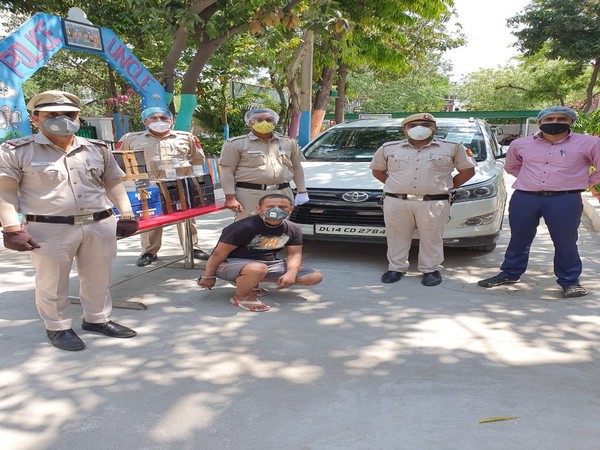 The man who was arrested with 54.5 litres of illegal liquor and 60 boxes of cigarettes in Delhi's Kalkaji area.