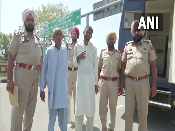 Visual of two Pakistani nationals with the police personnel (Photo/ANI) 
