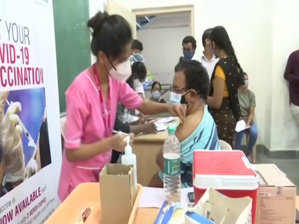 Beneficiaries getting vaccinated at the Arora's Degree and PG College in Hyderabad. (Photo/ANI)