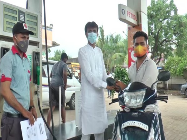 A beneficiary availing the free petrol scheme (Photo/ANI)