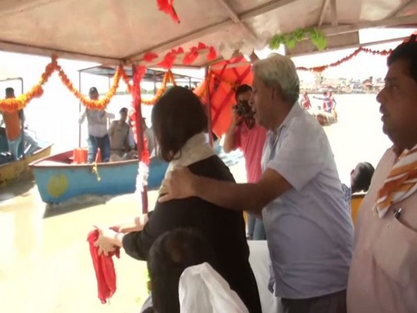 Bansuri Swaraj and Kaushal Swaraj immersing ashes of Sushma Swaraj in Ganga River in Hapur. 