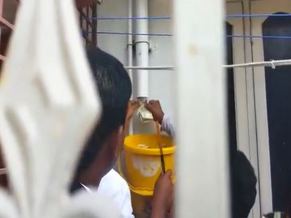 Visual from the raid; ACB officials recovering cash from drian (Photo/ANI)