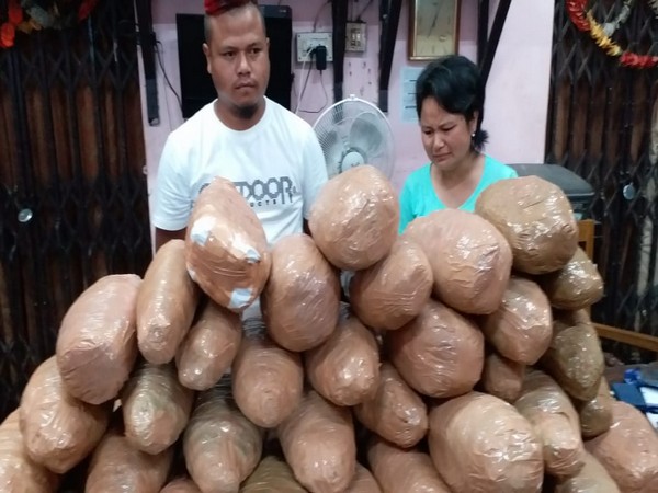 Two siblings who were arrested by the Railway Police along with the cannabis recovered from them on Monday in Guwahati. Photo/ANI