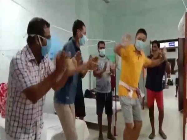 A visual from the video where Coronavirus patients dance and sing at a quarantine centre. (Photo/ANI)
