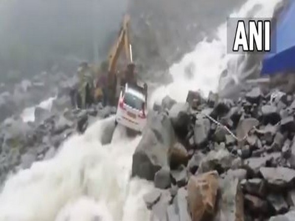Visuals of BRO rescuing occupants of a car at the swollen Lambagad nallah near Badrinath National Highway (Photo/ANI)