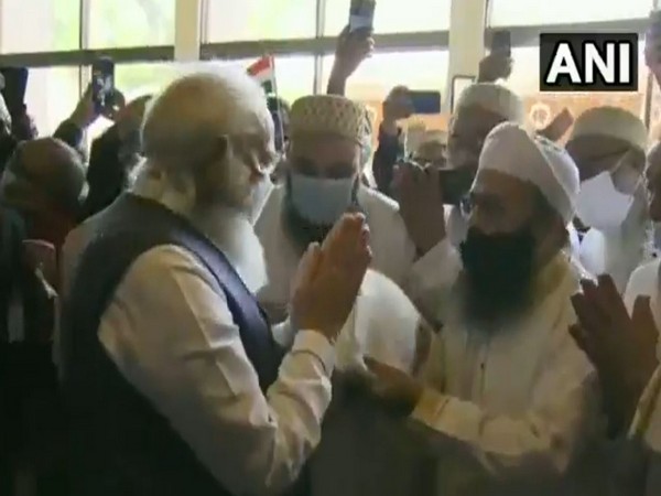 Prime Minister Narendra Modi greeting members of Indian diaspora in Bangladesh on Friday.