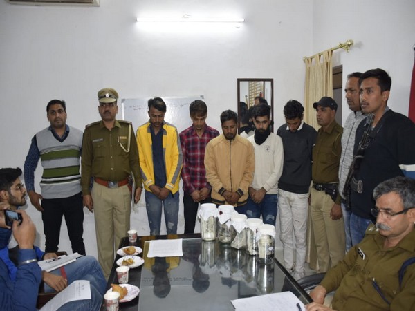 The arrested accused in police custody.