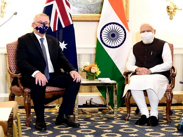 Prime Minister Narendra Modi (right) with Australian counterpart Scott Morrison (left) (File Photo/ANI)