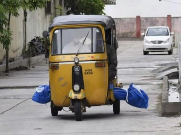 Body of COVID-19 patient taken to burial ground in an auto in Nizamabad, Telangana. (Photo/ANI)