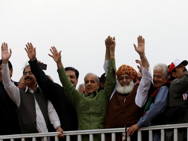 Fazalur Rehman, president of the Jamiat Ulema-e-Islam-Fazal (JUI-F) and Shehbaz Sharif at the Azadi March on Friday.