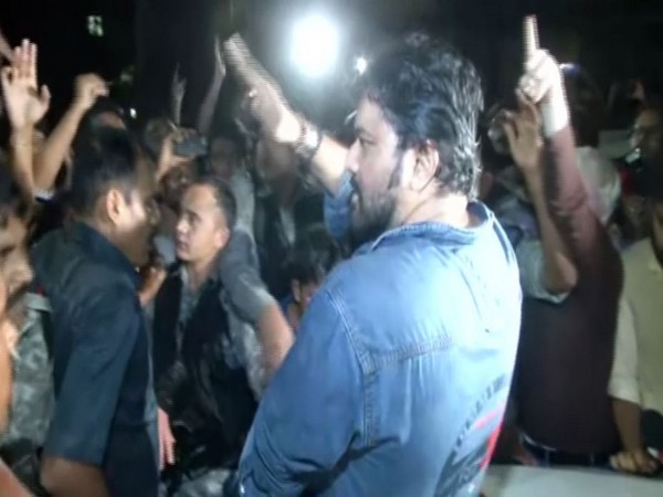 Union Minister Babul Supriyo sat on the bonnet of a media vehicle amid protest by a section of students in Jadavpur University on Thursday. Photo/ANI