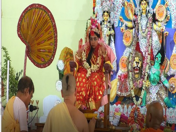 A five-year-old-girl being worshipped as Lord Durga on Maha Ashtami in Agartala in tripura on Sunday. Photo/ANI