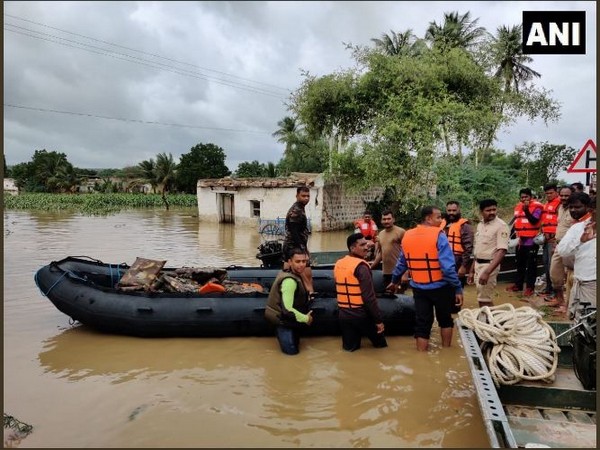 Security forces carrying out rescue ops in Badami on Saturday. Photo/ANI