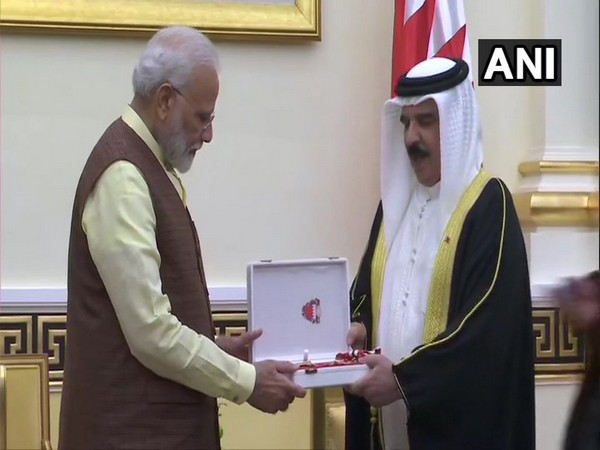 Prime Minister Narendra Modi being honoured with 'The King Hamad Order of the Renaissance' by the King of Bahrain, Hamad bin Isa Al Khalifa, in Manama on Saturday (Photo/ANI)