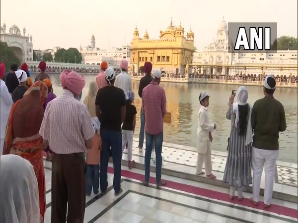 Devotees on Thursday, on the occasion of Baisakhi took a holy dip and offered prayers at the Golden Temple. (ANI/photo)