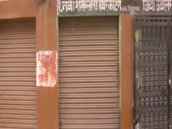 Closed barber shops in Pipalsana Bhojpur village of Moradabad. Photo/ANI