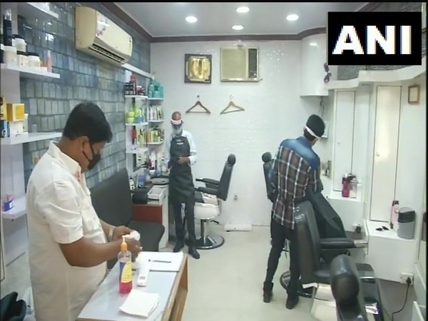 Barber shops, salons reopen in Lucknow. Photo/ANI