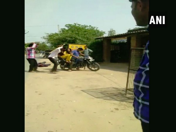 A video showing the couple being beaten up /ANI